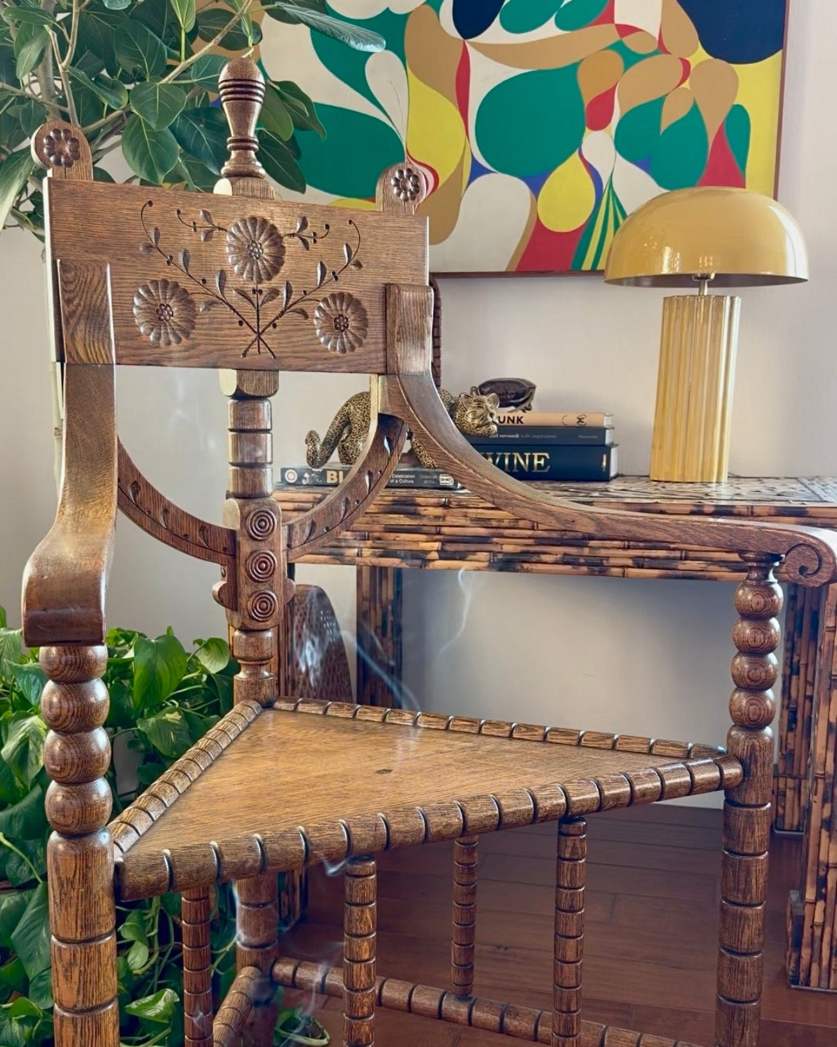 Antique Swedish munkstol monk chair in carved oak with floral rosettes, turned finial and bobbin-turned legs