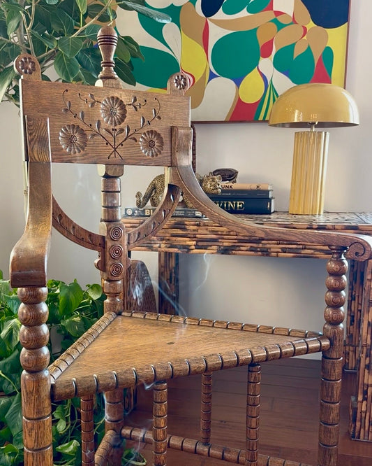 Antique Swedish munkstol monk chair in carved oak with floral rosettes, turned finial and bobbin-turned legs