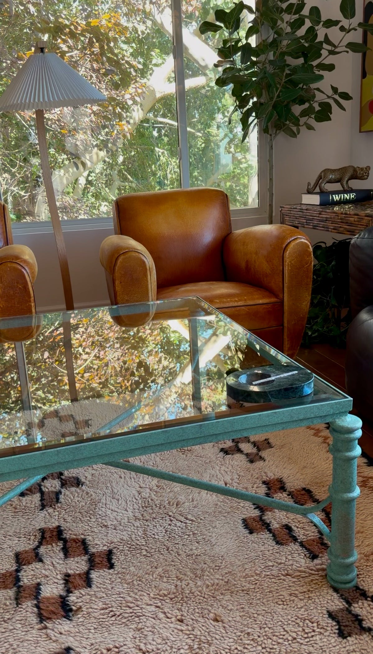 Verdigris iron and glass coffee table, hand-shaped base in the manner of Diego Giacometti
