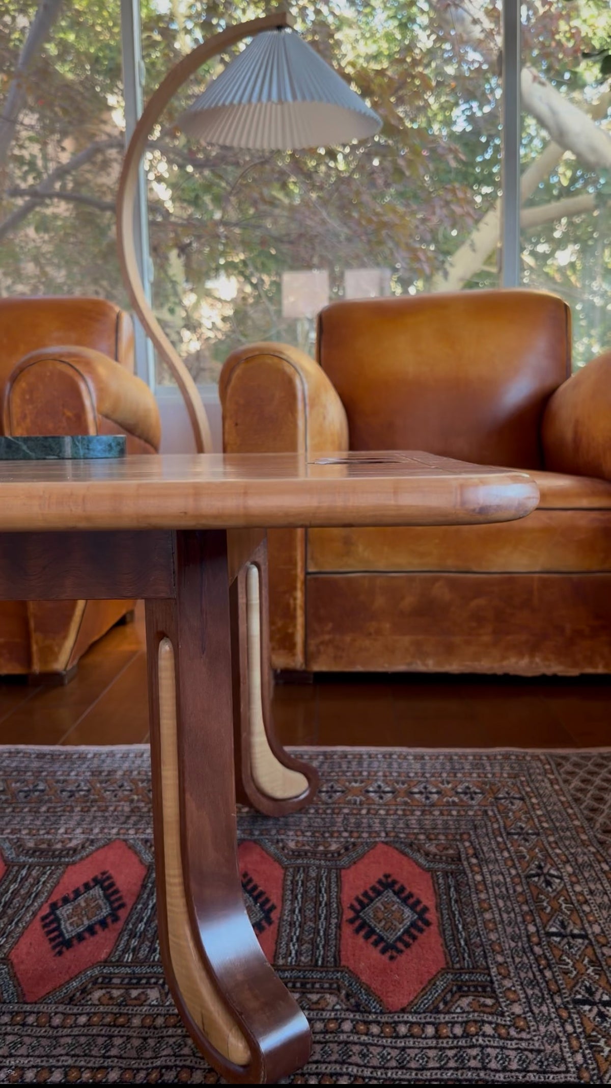 Detail of the sculpted legs on the American studio craft coffee table