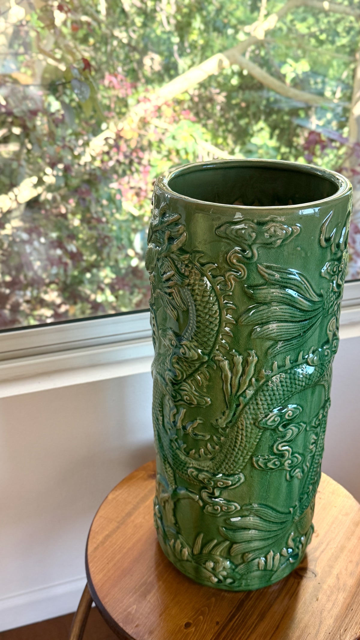 Base of the Chinese umbrella stand, unglazed clay marked at the foot