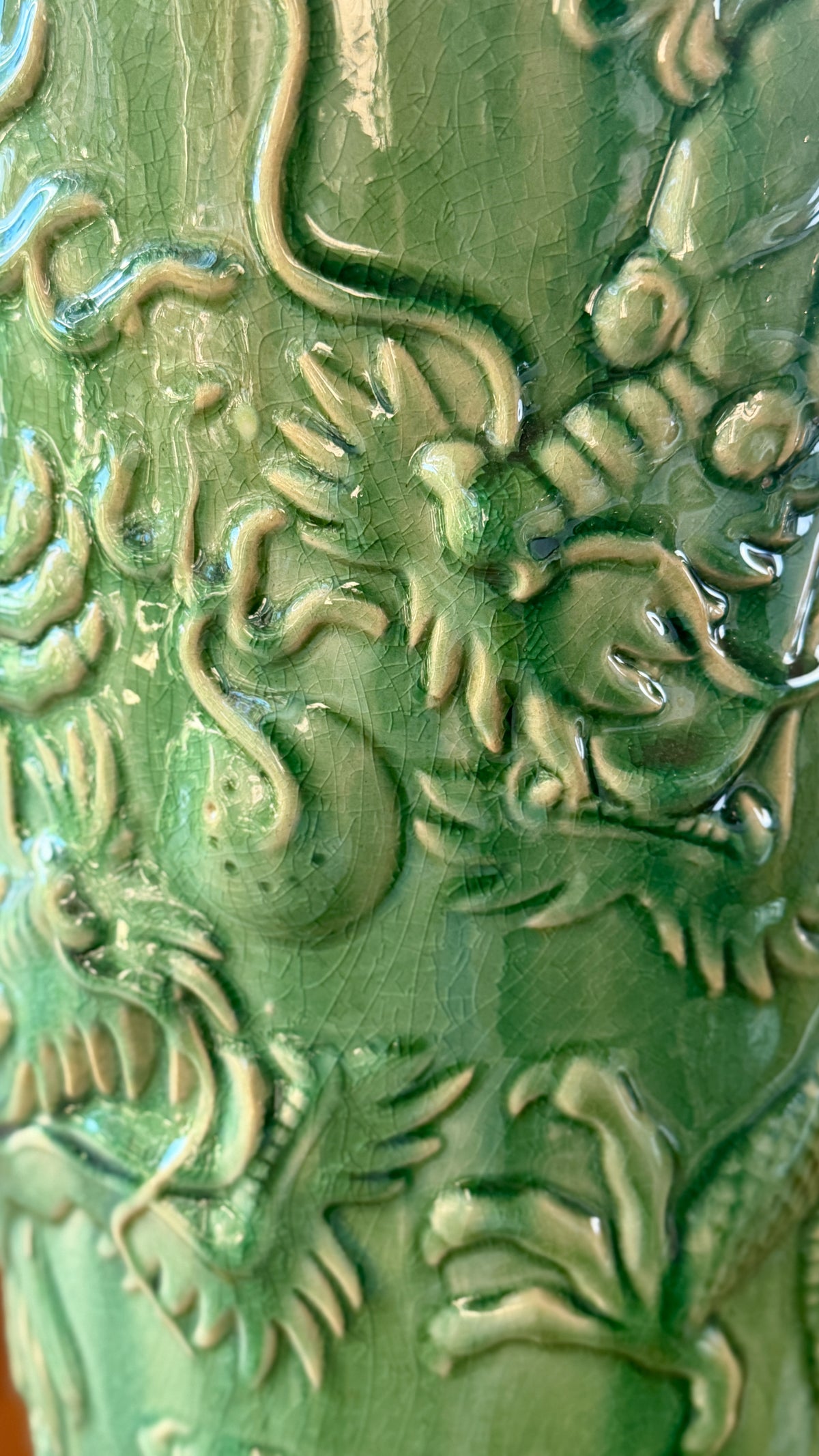 Unglazed interior of the ceramic umbrella stand showing the ridges left by the wheel