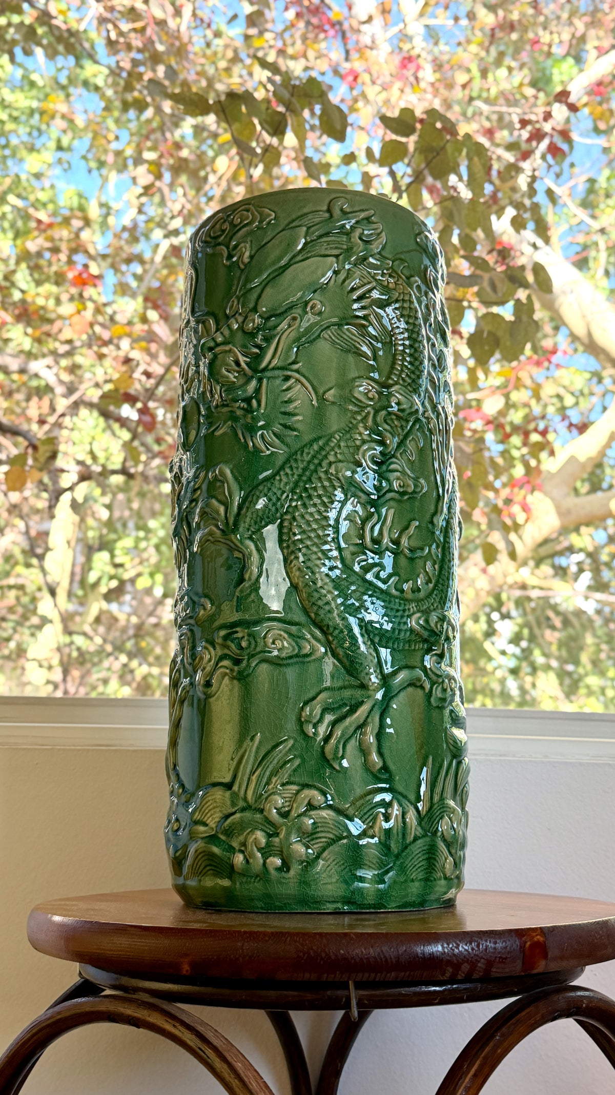 Chinese dragon umbrella stand in green crackle glaze, two dragons modelled in relief, 22 inches tall