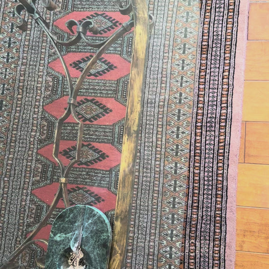 Video of the scrolled iron stretcher where it joins the uprights