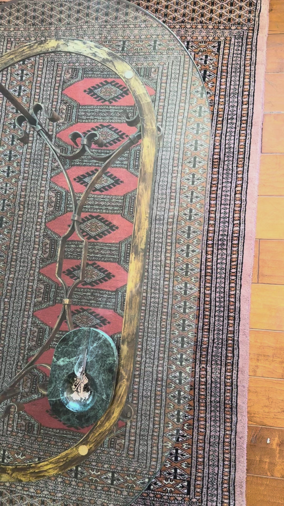 Video of the scrolled iron stretcher where it joins the uprights