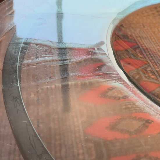 Video showing light gathering in the dropped centre well of the glass top