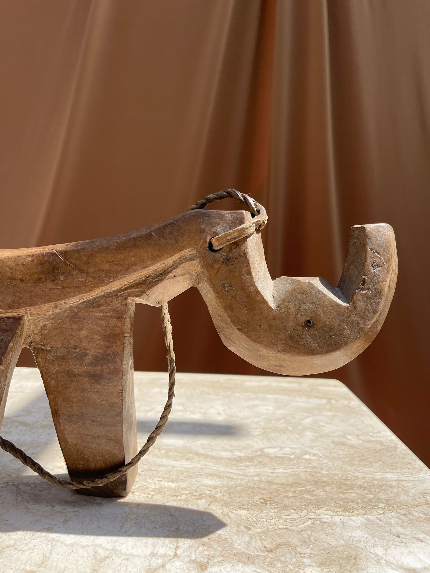 Detail of the braided leather carrying cord on the Lobi stool
